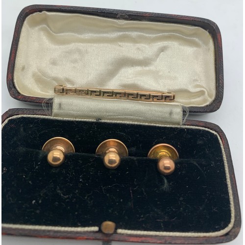 354 - Three 9ct gold collar studs 2.3gm together with a 9ct gold tie pin with base metal liner in a fitted... 