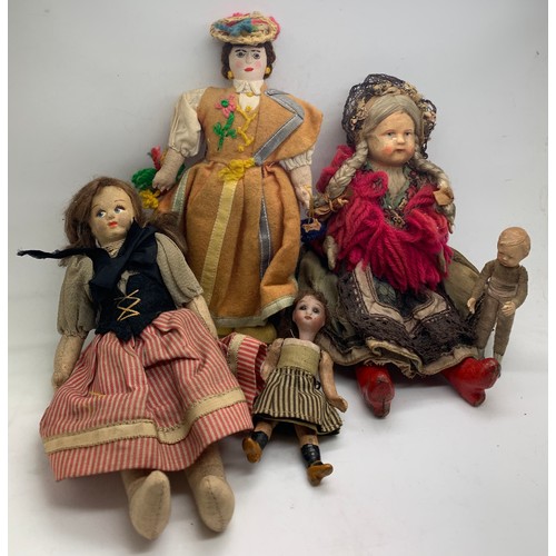 712 - Late 19th/early 20thC costume dolls, to include Swiss cloth, bisque and others, x 5.  Largest 20cm h... 