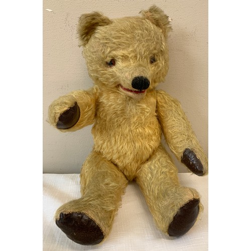 714 - An early 20thC mohair teddy with opening mouth mechanism.  38cm h.