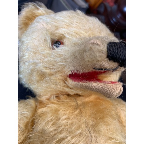 714 - An early 20thC mohair teddy with opening mouth mechanism.  38cm h.