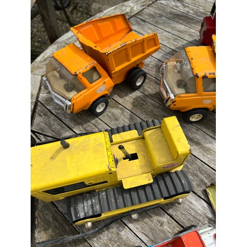 727 - Tonka tin plate vehicles to include Goodyear Bus, Tipper Vans, Bulldozer etc.