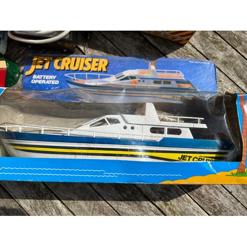 729 - A collection of toys to include a radio controlled Tide Runner by Nikko, A Jet Cruiser by Roxy Toys,... 