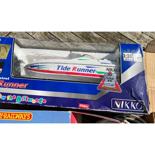 729 - A collection of toys to include a radio controlled Tide Runner by Nikko, A Jet Cruiser by Roxy Toys,... 