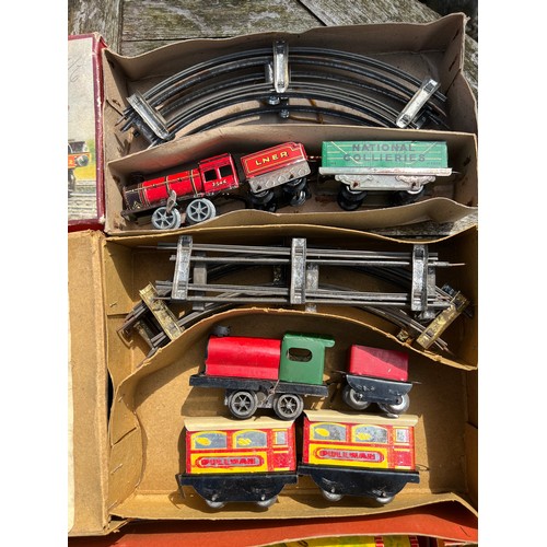 732 - Three Vintage train sets to include Brimtoy etc.