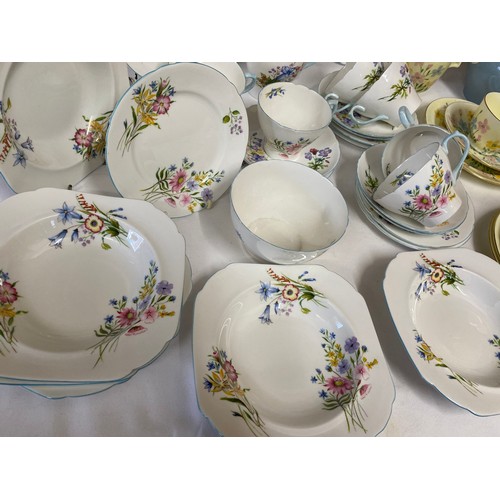 95 - Two part tea services. Shelley 'Wild Flowers' 13668 comprising fruit bowl 24cm d, 6 x fruit dishes, ... 