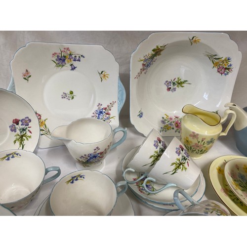 95 - Two part tea services. Shelley 'Wild Flowers' 13668 comprising fruit bowl 24cm d, 6 x fruit dishes, ... 