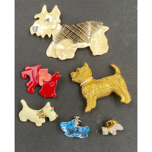 355 - A collection of dog brooches, mainly Scottie dogs to include 2 Lea Stein, 2 x Ciro, A. Diamond, Kaye... 