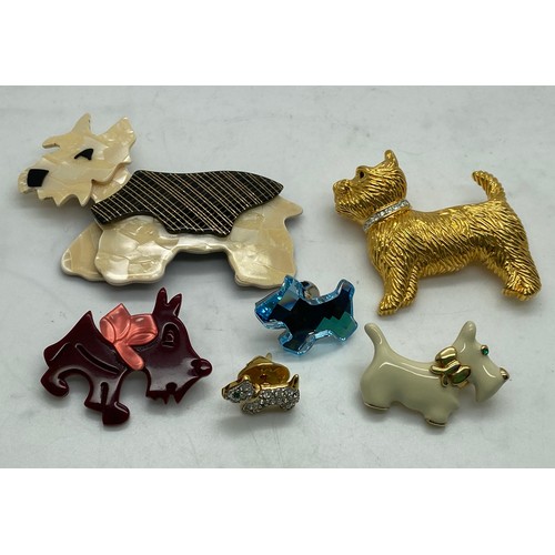 355 - A collection of dog brooches, mainly Scottie dogs to include 2 Lea Stein, 2 x Ciro, A. Diamond, Kaye... 