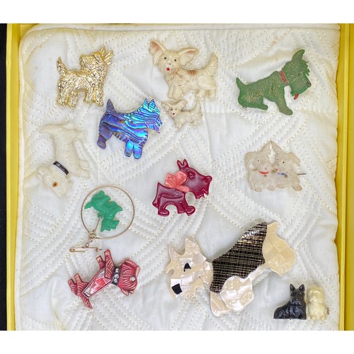 355 - A collection of dog brooches, mainly Scottie dogs to include 2 Lea Stein, 2 x Ciro, A. Diamond, Kaye... 