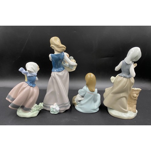 99 - Four pieces of Lladro comprising Spring is Here, Cat Nap, Perritos al costado 25cm h and Paloma al r... 