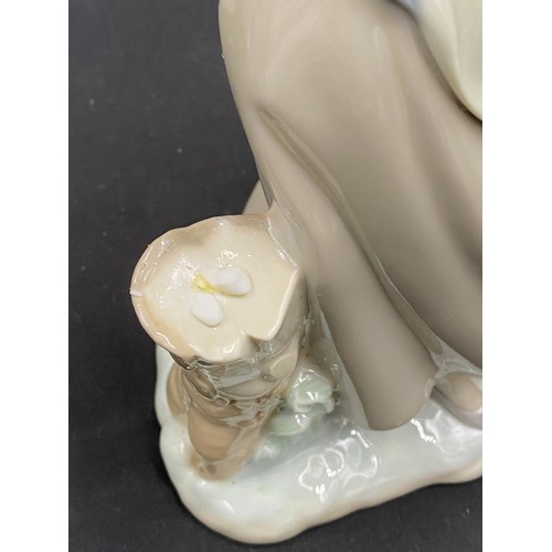 99 - Four pieces of Lladro comprising Spring is Here, Cat Nap, Perritos al costado 25cm h and Paloma al r... 