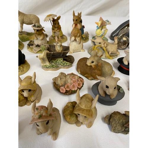 101 - A large collection of small rabbits to include 19 x Teviotdale, 1 x Royal Crown Derby paperweight wi... 