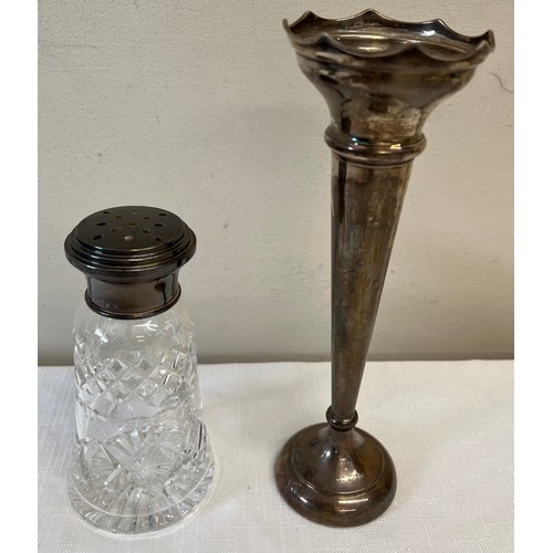 559 - Silver vase filled to base, Birmingham 1976 21cm h together with a silver topped sugar shaker.