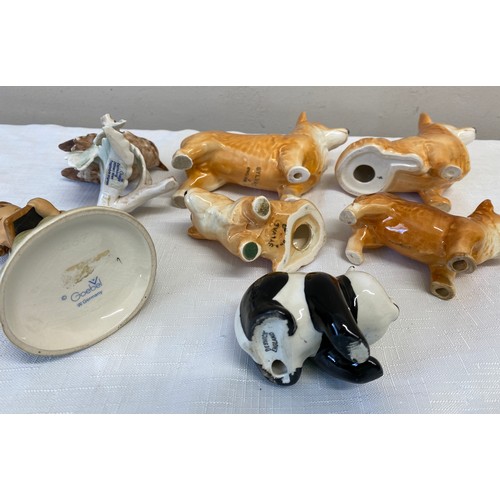 120 - Various ceramics to include; 2 x Goebel, figurine of girl and bird; Beswick panda and 4 x dogs, 2 ma... 