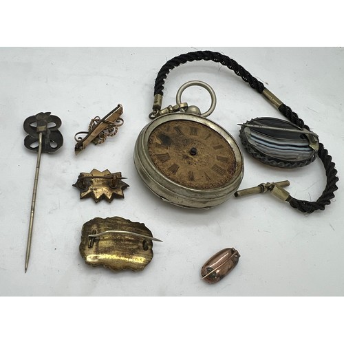 370 - A quantity of 19thC jewellery to include Georgian mourning brooches, banded agate brooch, John Forre... 