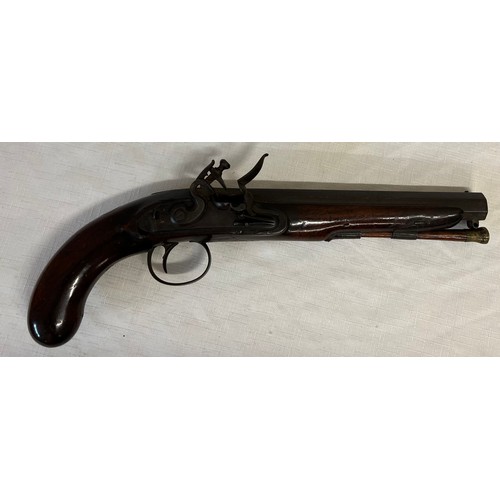 793 - A 19thC flintlock pistol by Ryan & Son London. Walnut stock. 36cm l.