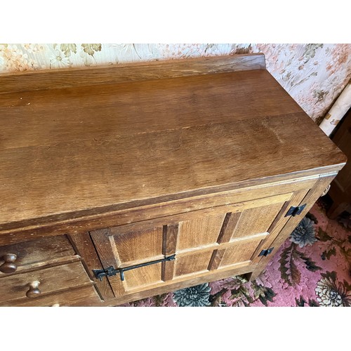 785B - Peter Heap Rabbitman, An Oak Panelled Sideboard, with raised upstand above two cupboard doors enclos... 