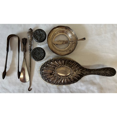 560 - Various items of silver to include lidded glass pots, hair brush, butter dish, button hook and Georg... 