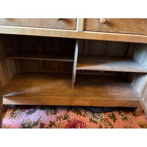 784 - Peter Heap Rabbitman oak Dresser raised back with open shelves, two drawers and cupboards under, and... 