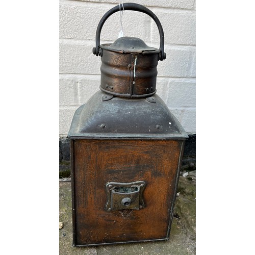 1043 - A Vintage copper 'stem' ships lamp. 47cm h.