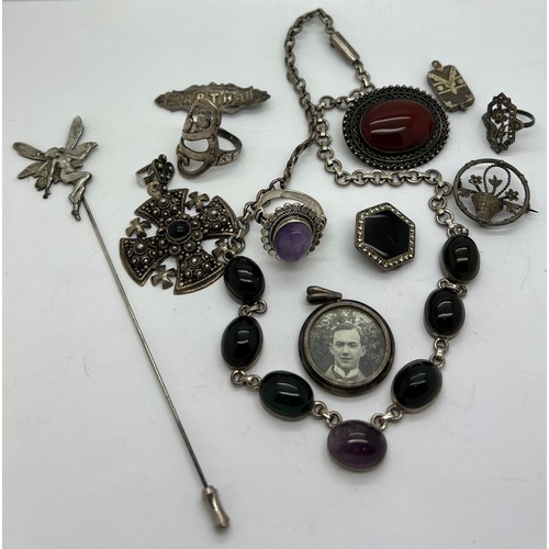 376 - A quantity of vintage silver and white metal jewellery to include brooches, rings, pendants, necklac... 