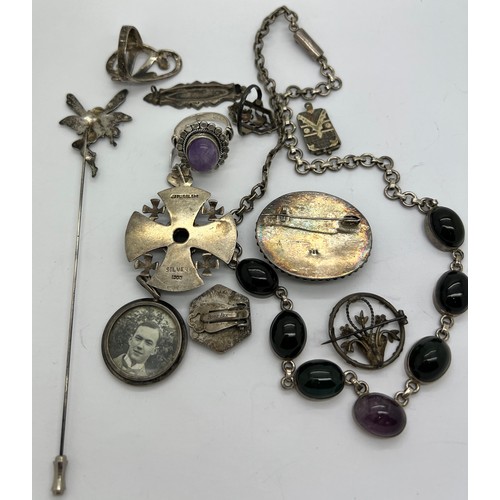 376 - A quantity of vintage silver and white metal jewellery to include brooches, rings, pendants, necklac... 