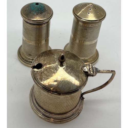 566 - Three piece silver cruet set Birmingham 1933 by Joseph Gloster Ltd. Total weight 186gm.