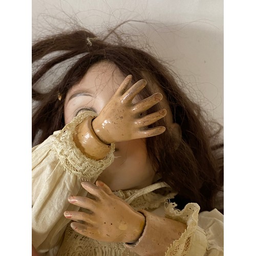 742 - A Mah Handwerok jointed German bisque Doll, marked to the back of the neck 48cms long with sleeping ... 