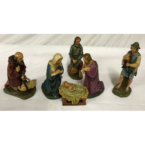 1048 - A part ceramic 6 piece nativity set comprising Baby Jesus, Mary, Joseph and the Three Kings; tallest... 