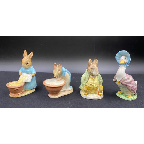 129 - Four early Beswick Beatrix Potter's figures to include Samuel Whiskers, Jemima Puddleduck, Cecily Pa... 