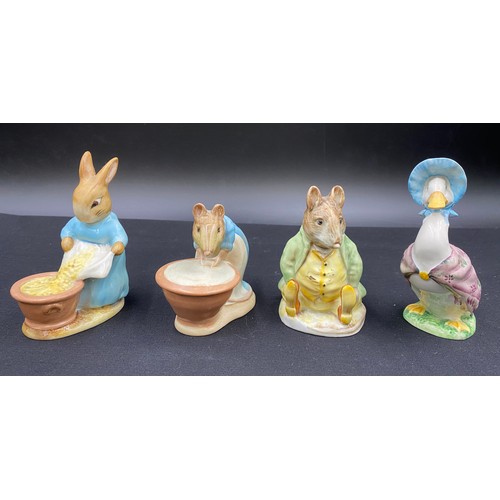 129 - Four early Beswick Beatrix Potter's figures to include Samuel Whiskers, Jemima Puddleduck, Cecily Pa... 