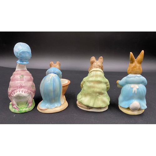 129 - Four early Beswick Beatrix Potter's figures to include Samuel Whiskers, Jemima Puddleduck, Cecily Pa... 