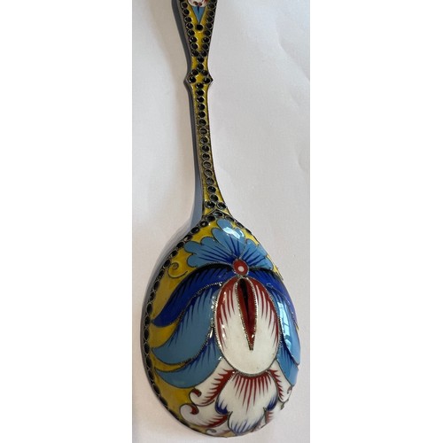 573 - Russian silver enamel spoon together with two spoons and two napkin rings. 150gm total weight.