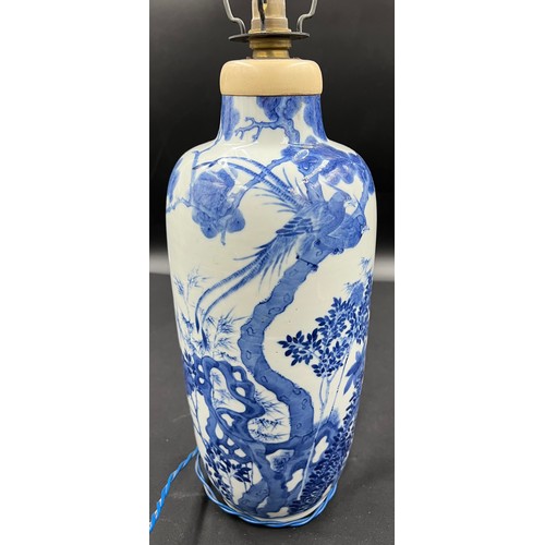 134 - A Chinese porcelain blue and white jar converted to lamp. 40cm h to vase top.