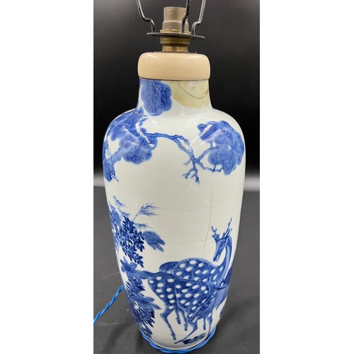 134 - A Chinese porcelain blue and white jar converted to lamp. 40cm h to vase top.