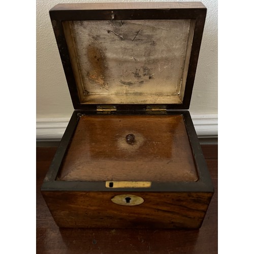 1053 - Mahogany tea caddy with mother of pearl to top, escutcheon and inlay to top edges. inner lift to rev... 