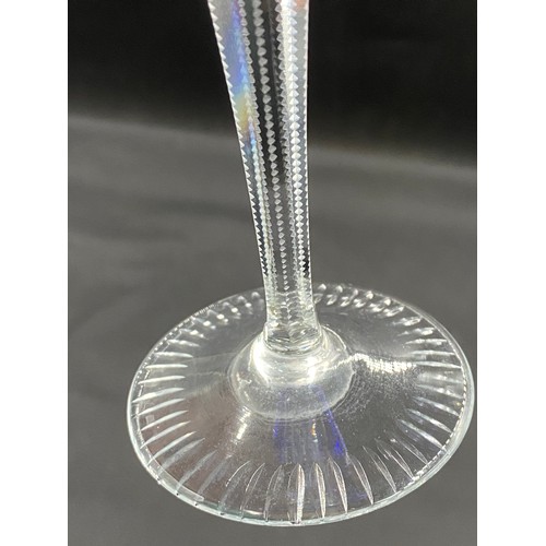 318 - Ten coloured glass hock glasses with faceted stems. 20cm h.