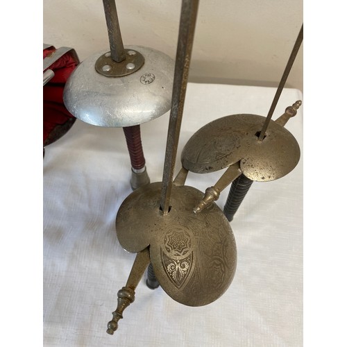 1056 - Two basket hilted replica swords for the Royal Scots Fusiliers and a Leon Paul fencing foil and two ... 