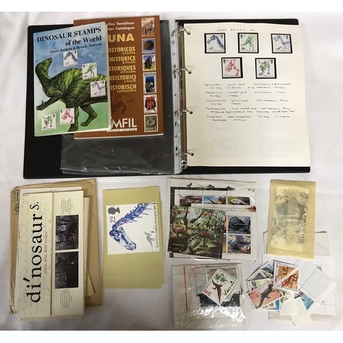 441 - Collection of Dinosaur Themetic stamps of the World including two books on the subject. Also include... 