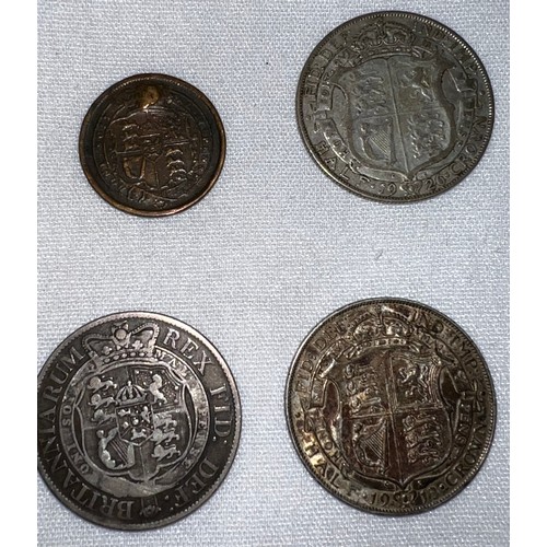 444 - A George III crown 1818, shield back,  George III 1817 shilling, George V half crown 1913 and 1926.