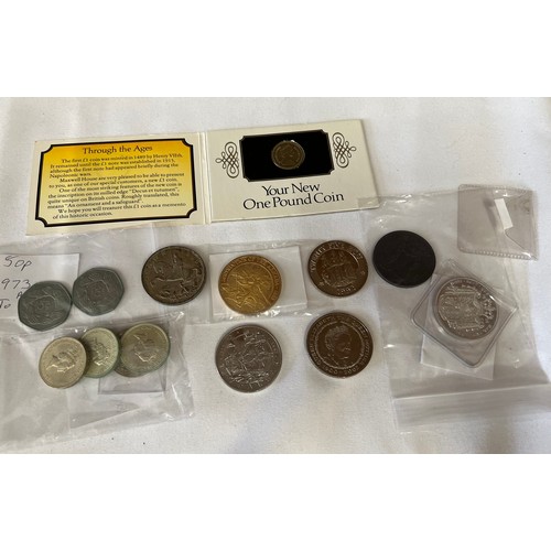 451 - A collection of coins to include 2005 £5 Trafalgar coin, Queen Elizabeth 1900-2002 £5, 1935 George V... 