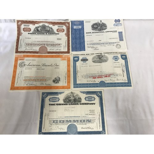 457 - Five Shares certificates to include Barker international corporation, The Grand Union Company etc.