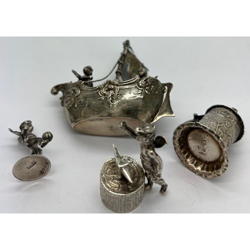 582 - Four continental silver miniatures all depicting cherubs with import marker - boat for Chester 1900.... 