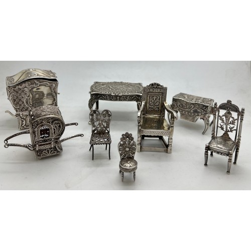 586 - Miniature silver and white metal continental furniture.