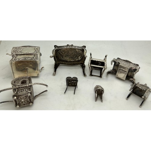 586 - Miniature silver and white metal continental furniture.