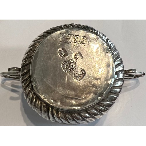 592 - A Queen Anne miniature porringer 4cm d x 3cm h with spiral fluting and wirework handles, London 1707... 