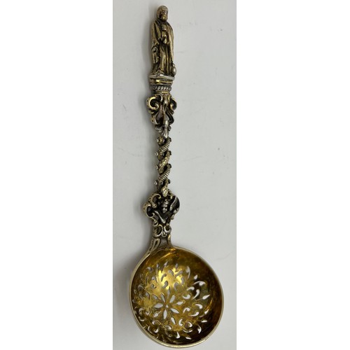 596 - A Victorian cast silver parcel gilt Apostle sifting spoon, 16cm l, weight 75gm. London 1872, maker H... 