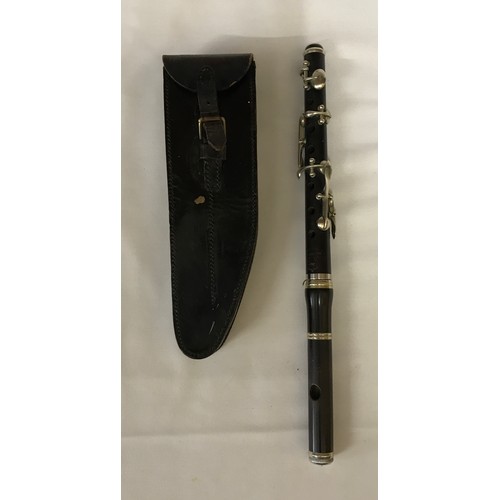 775 - A musical Fife by Hawkes & Son of London stamped with Royal crown AZ with leather case stamped Leath... 