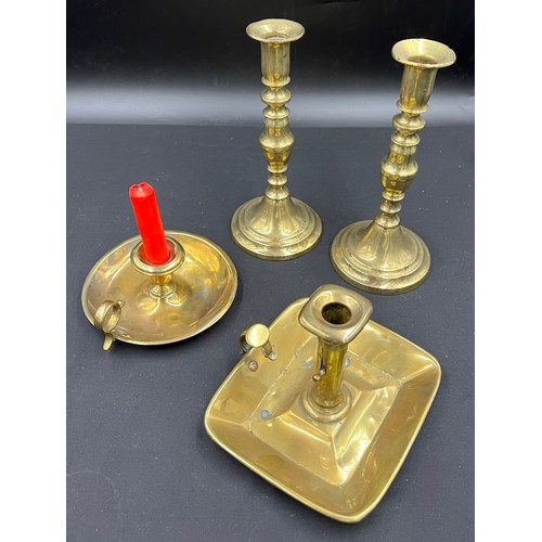 630 - Brass 19thC  to include a pair of heavy candlesticks with pushers 24cm h and two chambersticks, one ... 