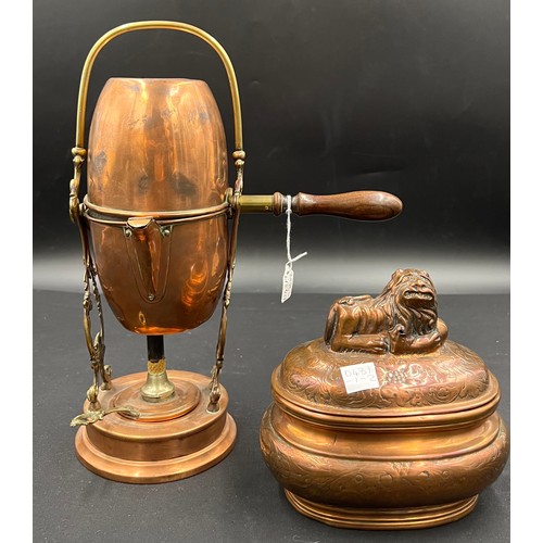 631 - A late 19thC French copper and brass coffee maker together with a 19thC copper tea caddy with recumb... 